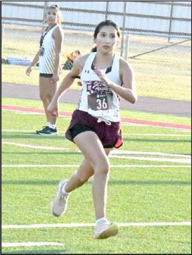 Brinley Acevedo pushes through to the finish line on Saturday at the Littlefield Invitational. (Staff Photo by Derek Lopez)