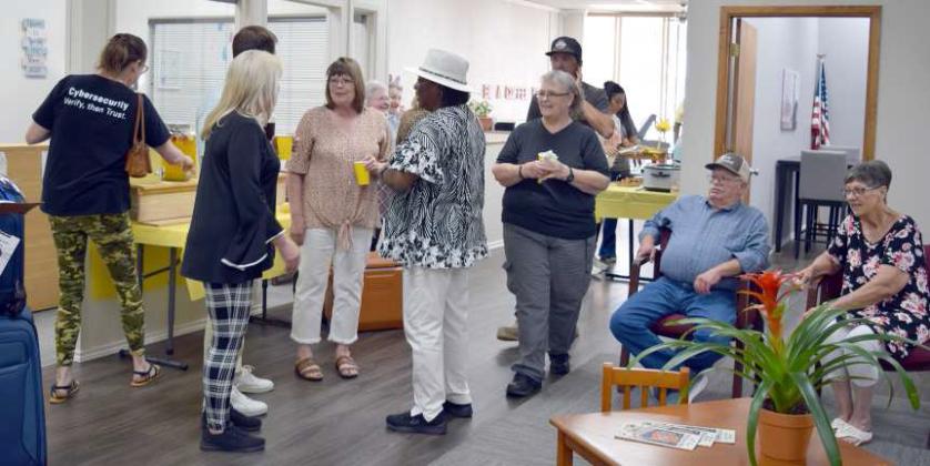CARRIE BARDEN visits with guests during a Come and Go Retirement Party in her honor held on Thursday, August 24, 2023 at the Family Resource Center in Littlefield, Texas. (Photo by Ann Reagan)
