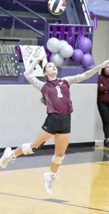 Littlefield sophomore, Bryndle Ray, leaps up to deliver a serve, during the first set of the Lady Cats’ Bi-district loss to Bushland on Monday in Dimmitt. (Staff Photo by Derek Lopez)