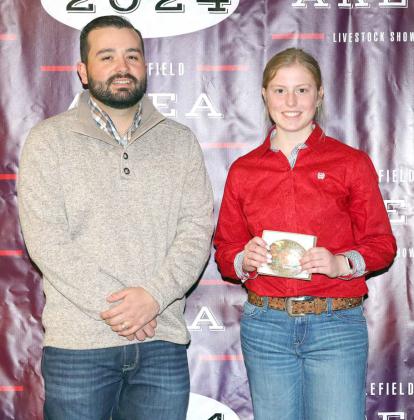 Senior Lamb Showmanship - Kamryn Meiwes, Littlefield 4-H, Wwith judge Walker Hemphill. (Photo by MD Creations)