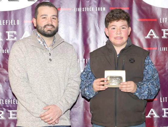Junior Lamb Showmanship Award - Jesus Macias, Amherst FFA. with judge Walker Hemphill. (Photo by MD Creations)