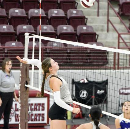 Littlefield’s Maggie McNeese goes up to deliver a kill, during their first set against Olton on Tuesday, in their final pre-district match of the season. (Staff Photo by Derek Lopez)