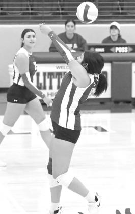 Olton’s Zayda Gonzales sends a ball over the net to keep the play alive, during the Fillies, 3-1, loss at Littlefield on Tuesday to close out the pre-district schedule. (Staff Photo by Derek Lopez)