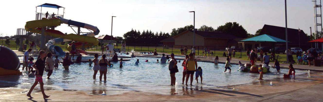 Attending families enjoy the Littlefield Aquatic Center during the Littlefield Chamber of Commerce’s free Pool Party on Aug 3. (Photo by Leon Szaniszlo)