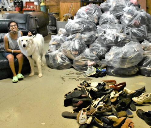 CECI SCHROEDER with Service Dog Gracie Mae, and her massive shoe collection. (Photo by Krista Carpenter)