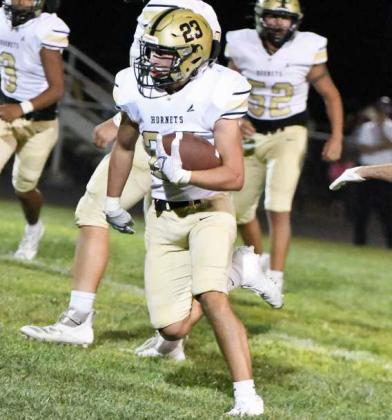 Sudan’s Kyler Edwards (23), gets into the open field on a run, picking up a first down, before being brought down during thefourth quarter of their win over Vega on Friday night. (Staff Photo by Derek Lopez)