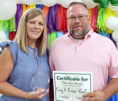 The Silver Spur Award, the highest honor given to an adult for their support of the 4-H program was presented to Cary and Carrie Hanlin.