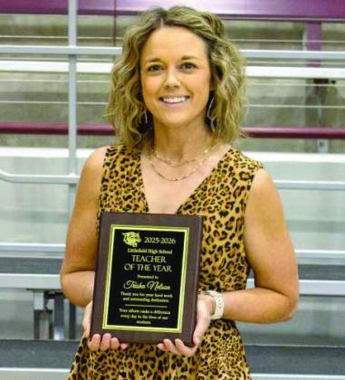 Littlefield High School teacher Trisha Nelson receives the Teacher of the Year Award at the academic awards on May 19, 2026. (Photo by Madison Vidales)