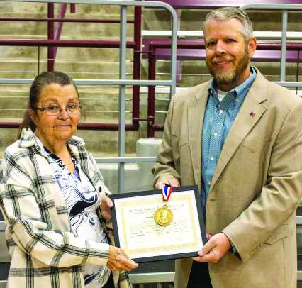 The Masonic Grand Lodge of Littlefield presents the Mirabeau B. Lamar Award of Excellence to Hettie Bennink at the Littlefield High School academic awards ceremony. (Photo by Madison Vidales)