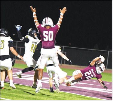 Littlefield’s Daniel Rojas (22) dives into the endzone for his first touchdown of the season, during the Wildcats’, 60-6, victory in their home-opener over Lamesa last Friday at Wildcat Stadium. (Staff Photo by Derek Lopez)