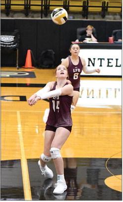 Littlefield’s Rylee Miller (14) sends a hit over the net, during the Lady Cats’, 2-3, loss to the Lady Lopes last Tuesday in Post. (Staff Photo by Derek Lopez)
