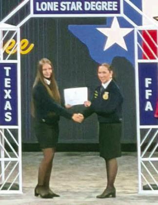 Maggie McNeese receives a Lone Star FFA Degree during the 98th annual Texas FFA State Convention in Fort Worth July 6–10. (Submitted Photo)