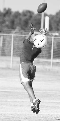 Littlefield’s Jayden Barrio, makes an over the shoulder catch during a drill on the first day of two-a-days Monday morning. (Staff Photo by Derek Lopez)