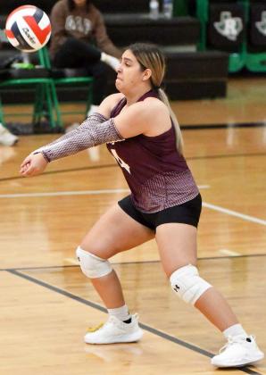 Littlefield’s Gabby Medina digs out a hit in the back row, during set three of the Lady Cats victory over Klondike at Ropes on Tuesday during their dual. (Staff Photo by Derek Lopez)