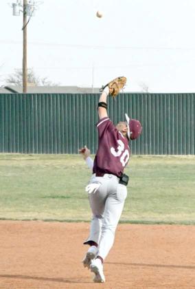 OUT IN THE AIR - Littlefield first baseman, Adam MacDonald, drifts over to second base and catches a high pop fly for an out, during the Wildcats’, 14-4, run rule of the Roosevelt Eagles last Saturday on the road. (Staff Photo by Derek Lopez)