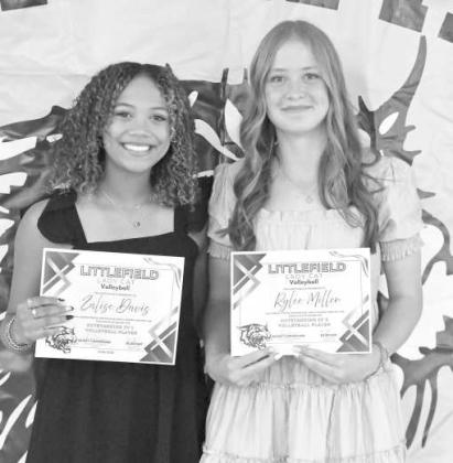 Outstanding JV1 Volleyball Player - Zalise Davis and Outstanding JV2 Volleyball Player Rylee Miller.