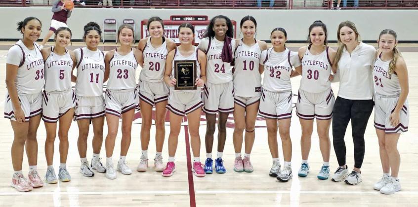 The Littlefield Lady Cats’ varsity basketball team captured the 33rd annual Wildcat Classic Championship on Saturday night, taking down Clarendon, 69-60. On Friday they defeated Tulia, 60-17, in the first round, and they defeated Forsan, 73-27, to advance to the Championship game. (L-R): Nia Cleveland, Bri Martinez, Aubree Richardson, Cobi Saldana, Ari Castillo, Cali Saldana, Amoni Jefferson, Nevaeh Lopez, Madi Williams, Bri Valdez, Marysa Saenz and Mattie Seymore. (Staff Photo by Derek Lopez)