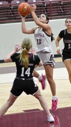 Littlefield’s Cali Saldana (12), goes up strong for a lay-up, during the first half of the Lady Cat’s, 69-60, victory over Clarendon on Saturday in the 33rd annual Wildcat Classic Championship. (Staff Photo by Derek Lopez)