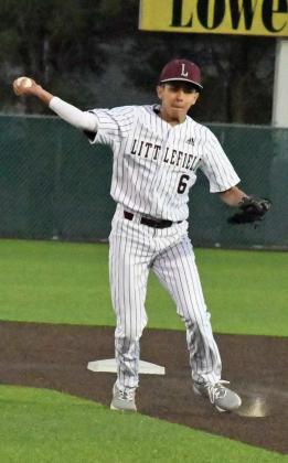 GETTING THE OUT —Littlefield senior second baseman, Jeremiah Salazar, charges a grounder hit by River Road’s Lance Welps and throws to first to get the out, during the top of the fifth inning of the Wildcats’ walk-off victory over River Road on Thursday. (Staff Photo by Derek Lopez)