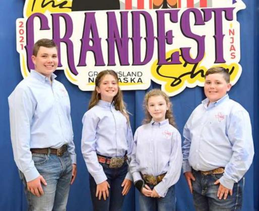 Olton winners at the National Jr. Angus Show