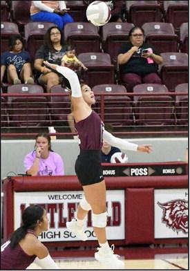 Littlefield’s Mattie Seymore, goes up to deliver a hit, during the first set of the Lady Cats’ 0-3 loss to Denver City on Tuesday at Wildcat Gym. (Staff Photo by Derek Lopez)