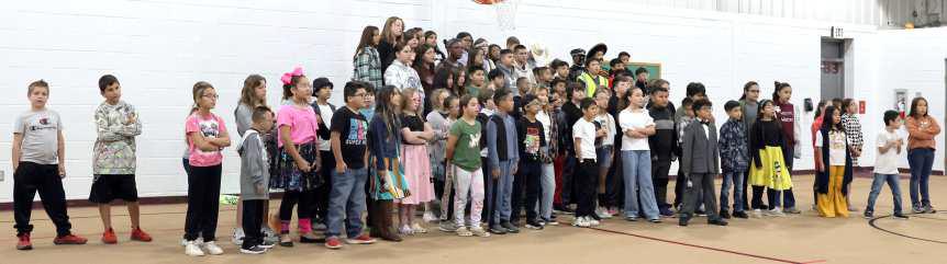 Littlefield Elementary School fourth graders sing during their “I Choose to Tune Out Drugs” program in conjunction with DARE week on Friday, October 27, 2023. (Photo by Ann Reagan)