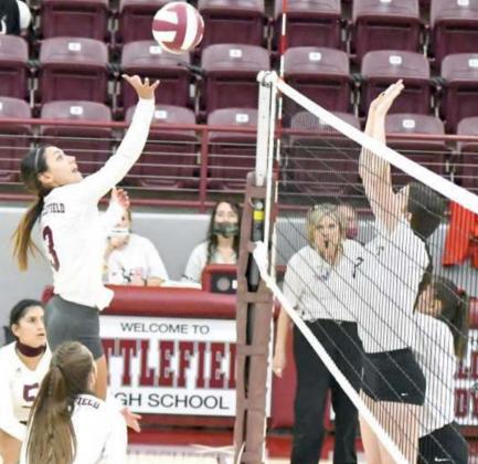 TIP FOR KILL – Littlefield senior captain, Geyah Garza, tips a ball over two Lamesa blockers for a kill, during Tuesday nights match-up with the Lady Tornadoes at Wildcat Gym. (Staff Photo by Derek Lopez)