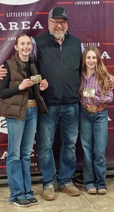 (Left) Piper Carr of Littlefield 4-H won the Senior Beef Showmanship Award and (Right) Paisli Claunch of Sudan 4-H won the Junior Beef Showmanship Award at the 2025 Littlefield Area Junior Livestock Show that got underway Thursday in Littlefield. They are pictured with Judge Matt Popelka. (Staff Photo by Grata Reber)