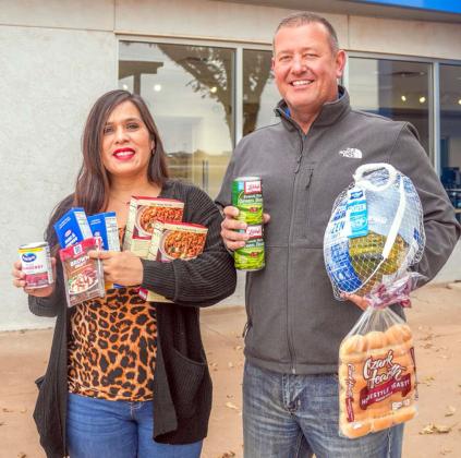 GIFTS OF WARMTH AND LOVE -- Margo and Jeff invite you to come out to Premier Littlefield on Tuesday, Nov. 21st starting at 5:30 p.m., to get a special Thanksgiving Frozen Turkey Meal Box giveaway. Limited supply. (Submitted Photo)