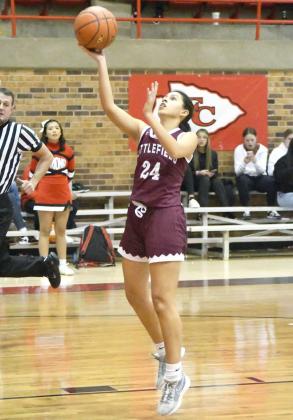 Littlefield’s Danica Jouett gets out on the break and finishes a the rim with a lay-up, during the first half of the Lady Cat’s, 74-43, victory over Friona on the road on Tuesday. (Staff Photo by Derek Lopez)