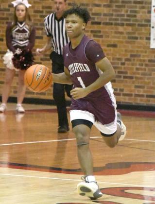 Littlefield senior guard, MJ Randle, pushes the ball up the floor looking to set up some offense, during the first half of the Wildcat’s, 75-41, victory over Friona on the road on Tuesday. (Staff Photo by Derek Lopez)