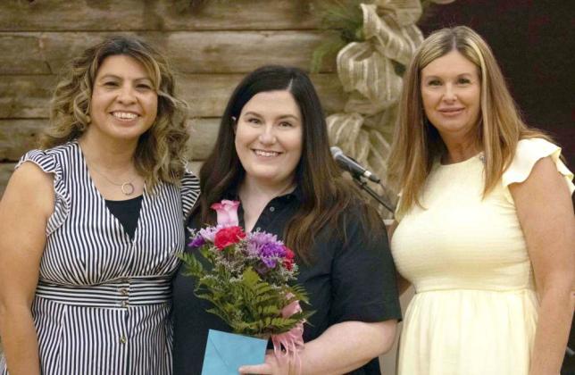 Rotary Club of Littlefield President Lori Zinn, left, and President-Elect Bree Clark, right, pose alongside keynote speaker Taylor Ernst, center, at the Rotary Club of Littlefield’s Administrative Professionals’ Day luncheon on April 23, 2025. (Photo by Madison Vidales)