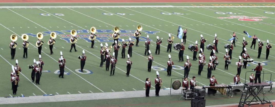 HEADED TO AREA - The Littlefield Marchin’ Cats Band is shown in an intricate formation performed at the UIL Region 16 Marching Contest, which was held at Lowery Field in Lubbock on Sat. Oct. 15. The Band under the direction of Bonnie Anderson once again brought home a Division I rating, qualifying them for the Class 3A Area Competition, which will be held at Shotwell Stadium in Abilene on Sat. Oct. 22nd. (Photo by Ann Reagan)