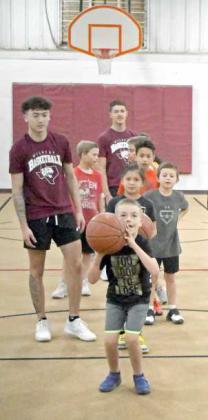 KNOCKOUT - Campers at the morning session of the Wildcat Youth basketball Camp played knockout during the final day of camp on Thursday. (Staff Photo by Derek Lopez)