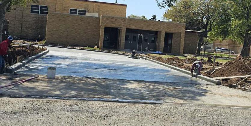 Construction continues at what will be the new Littlefield High School and Junior High sites this week, as crews poured the concrete for the Circle drive. (Staff Photos by Derek Lopez)