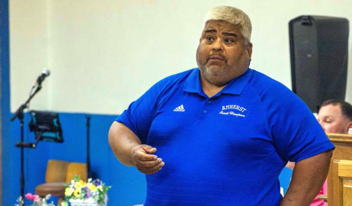 Amherst Head Coach Daniel Hinojosa gives a speech expressing gratitude for the donation awarded by the Amherst Chamber of Commerce on April 23, 2026. (Photo by Madison Vidales)