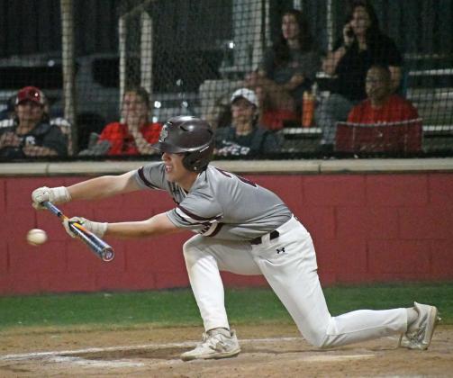 Littlefield senior, Major McNeese lays a bunt down on the third base line, during the top of the sixth inning, of the WIldcats, 16-5, victory over the Tigers in Slaton on Tuesday. (Staff Photo by Derek Lopez)