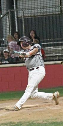 Littlefield senior, Ian Mendez, blasts an RBI-double off of the leftfield fence, during the top of the sixth inning, of the WIldcats, 16-5, victory over the Tigers in Slaton on Tuesday. (Staff Photo by Derek Lopez)