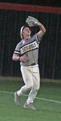 Littlefield senior right fielder, Jakob Kirkland, catches a fly ball in shallow right field for the second out in the bottom of the seventh inning, of the WIldcats, 16-5, victory over the Tigers in Slaton on Tuesday. (Staff Photo by Derek Lopez)