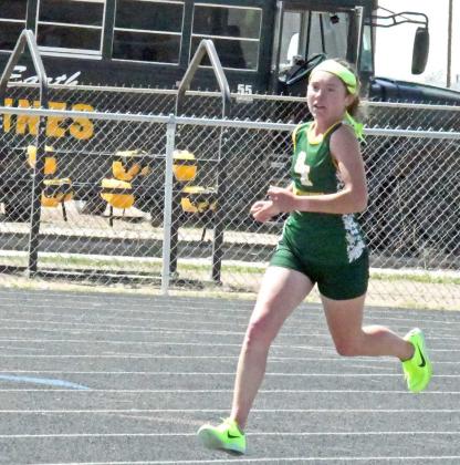 RACING TO GOLD - Springlake-Earth junior, Taytum Goodman, raced her way to three gold medals at the 1AArea Track Meet in Vega last Thursday. She won the 800-meter run, 1,600-meter run and the 3,200-meter run. The 1A Regional Track Meet was held on Friday and Saturday at South Plains College. Results were not available at press time. (Staff Photo by Derek Lopez)