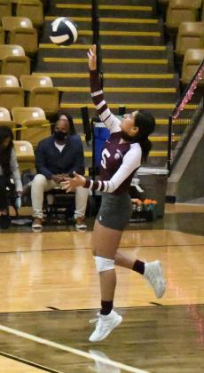 SENDING THE SERVE — Littlefield junior, Ellie Lopez, delivers a serve, during the Lady Cats’ Bi-district play-off match against Alpine at Andrews High School on Saturday night. (Staff Photo by Derek Lopez)