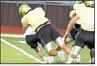 Sudan’s defense makes a play in the backfield, during their intersquad scrimmage last Saturday night at Hornet Stadium. (Staff Photo by Derek Lopez)