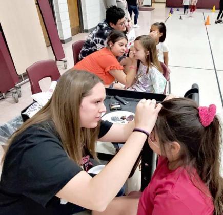 Participants of the Family Reading Night get their faces painted, during the first Family Rreading Night event hosted by Littlefield Primary School on Monday, Sept. 27th. (Submitted Photo)
