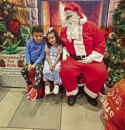 Children got a chance to visit Santa at the Littlefield McDonald’s on Thursday, Dec. 18th, during the Lamb County Sheriff Office’s annual Pie Drive to benefit their Christmas for Kids Toy Drive. (Staff Photo by Derek Lopez)