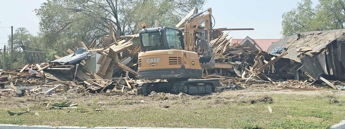 On Monday, the Lamb County Commissioners approved a contract with Alex Ojeda to begin demolition on a county property across the street from the Lamb County Courthouse. The property is being torn down to create more parking for the Courthouse. (Staff Photo by Derek Lopez)