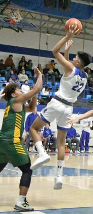 FADEAWAY – Olton’s Chris Urbina (22), puts up a fadeaway jumper from the left block over Springlake-Earth’s, Keshan Holmes (33), during the second half of the Mustang’s victory over the Wolverines on Tuesday at Mustang Gym. (Staff Photo by Derek Lopez)