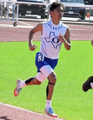 Olton’s Harry Amador, is shown competing in the men’s 3,200-meter run at the 2AArea Track Meet at Abernathy last Thursday. He qualified for Regionals in the event, as well as the men’s 800-meter run and the Mile. (Staff Photo by Derek Lopez)