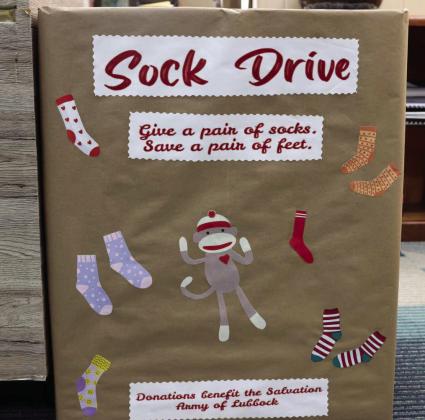 Sock Drive to help those in need. One Drop Box is set up at the Lamb County Library located at 110 E 6th Street, in Littlefield. Two boxes are set up at the 1st and 2nd floors of the Lamb Co. Courthouse in Littlefield. (Photo by Ann Reagan)