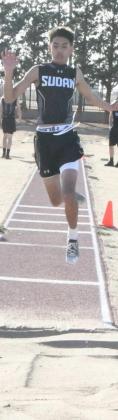 THIRD IN TRIPLE JUMP-Sudan junior, Michael Limon, leaps a distance of 35’10”, which was good for a third place finish in the boy’s varsity triple jump competition on Thursday at the 2021 Son Qualls Relays Track Meet at Sudan High School. (Staff Photo by Derek Lopez)