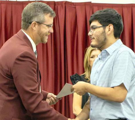 Daniel Garza receives the $500 Littlefield Elementary Scholarship at the Littlefield High School Scholarship Awards Ceremony on May 20, 2025. (Photo by Madison Vidales)